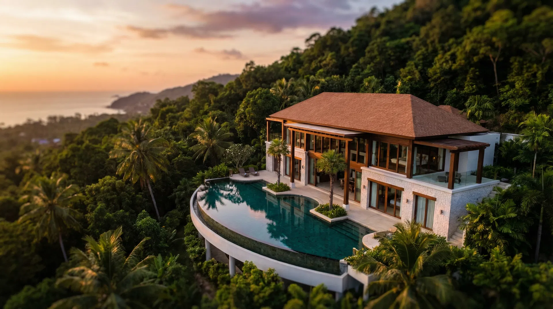 A private HOMI pool villa at dusk in Koh Phangan